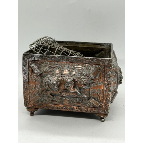 363 - A Malay Style Wedding crown, The Crown of metal set with faceted glass along with a metal flower box... 