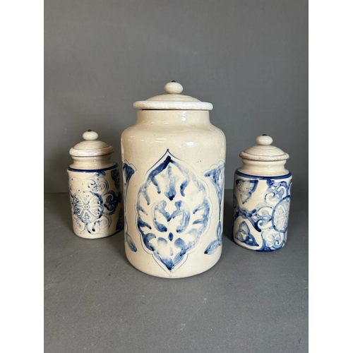 381 - A selection of three Indian blue and white printed and lidded jars