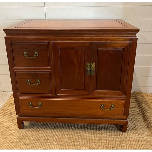 39 - A hardwood cabinet with metal work handles (H87cm W91cm D51cm)