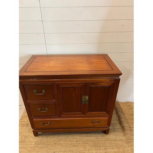 39 - A hardwood cabinet with metal work handles (H87cm W91cm D51cm)