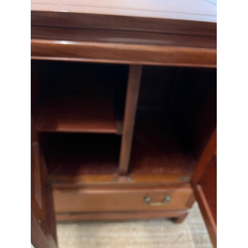 39 - A hardwood cabinet with metal work handles (H87cm W91cm D51cm)