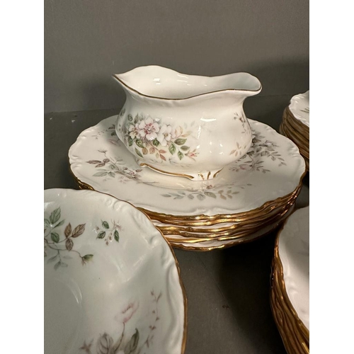 391 - A part Royal Albert Haworth tea service to include cups, saucers , bowls and plates