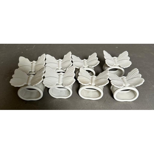 400 - A set of eight Fitz and Floyd butterfly while porcelain napkin rings