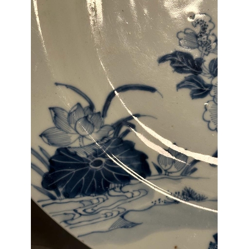 407 - A Chinese Kangxi blue and white peony dish. Diameter 33cm