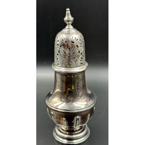 420 - A silver sugar shaker, hallmarked for London 1930, approximately 22cm H and 313g