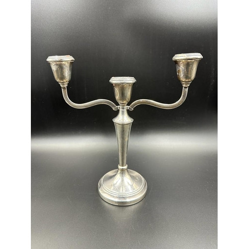 421 - A pair of two arm candlesticks, hallmarked for Birmingham 1971, by A Chick & Sons Ltd