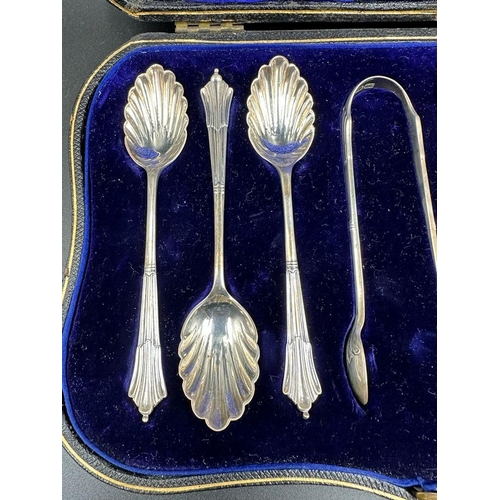 431 - A cased set of six teaspoons with shell bowls and a pair of sugar nips, hallmarked for London 1902 b... 