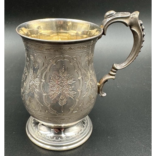 434 - A Victorian cased Christening tankard with floral design, hallmarked for Birmingham 1875, Hilliard &... 