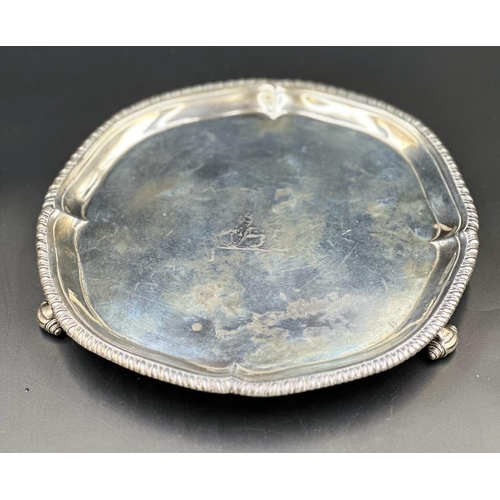 443 - A George III silver three footed tray, diameter 20cm, hallmarked for London 1769, makers mark I.C, a... 