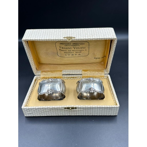 457 - A boxed pair of Italian silver napkin rings