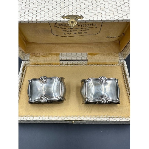 457 - A boxed pair of Italian silver napkin rings