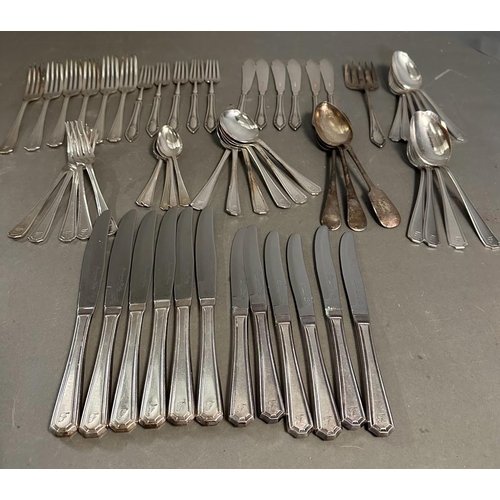 462 - A six place setting cutlery set by Insignia Plate along with some other plated cutlery.