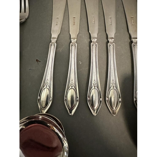 462 - A six place setting cutlery set by Insignia Plate along with some other plated cutlery.