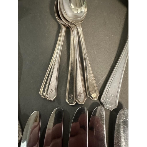 462 - A six place setting cutlery set by Insignia Plate along with some other plated cutlery.