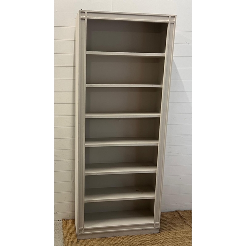 47 - A large painted open bookcase (H220cm W89cm D28cm)