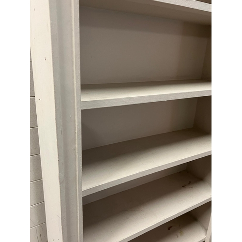 47 - A large painted open bookcase (H220cm W89cm D28cm)