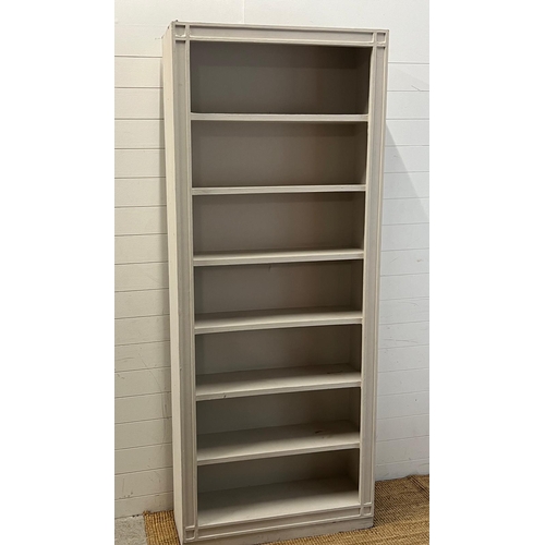 47 - A large painted open bookcase (H220cm W89cm D28cm)