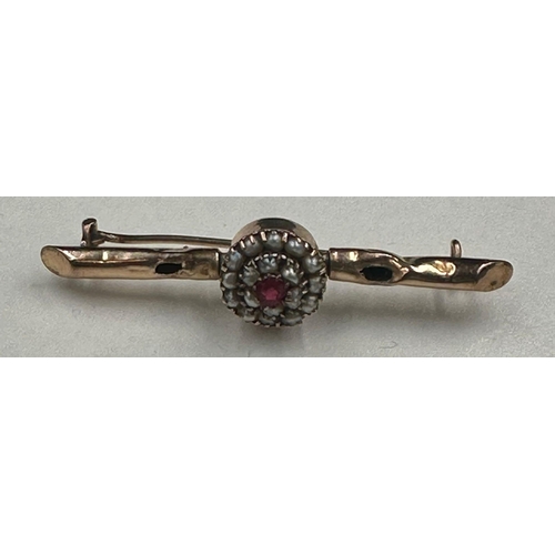 483 - An untested gold seed pearl and garnet brooch, approximate total weight 3.6g