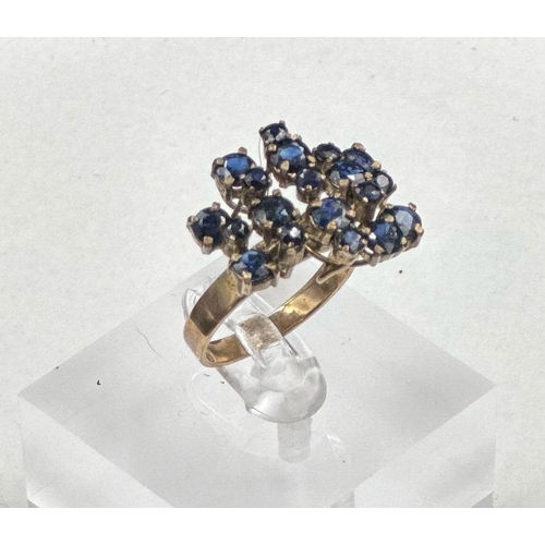 489 - A 14ct gold and blue stone cocktail ring, size P