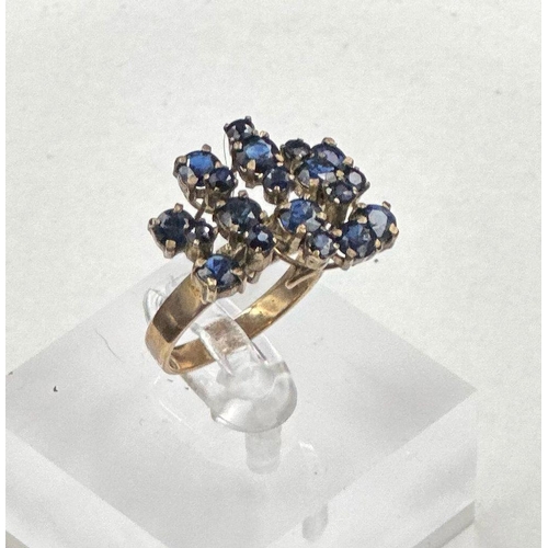 489 - A 14ct gold and blue stone cocktail ring, size P