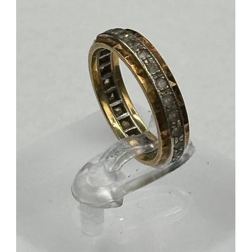 520 - An 18ct gold eternity style ring, size O, approximate weight 4.3g