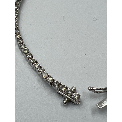 555 - An 18ct white gold Tennis or line bracelet set with approximately 3ct of diamonds.