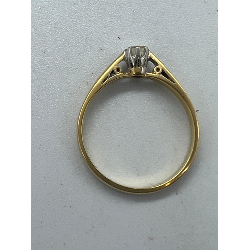 567 - An 18ct diamond ring on yellow gold setting Size P