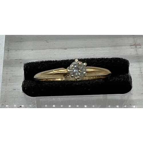 568 - A 14ct gold diamond ring, size L