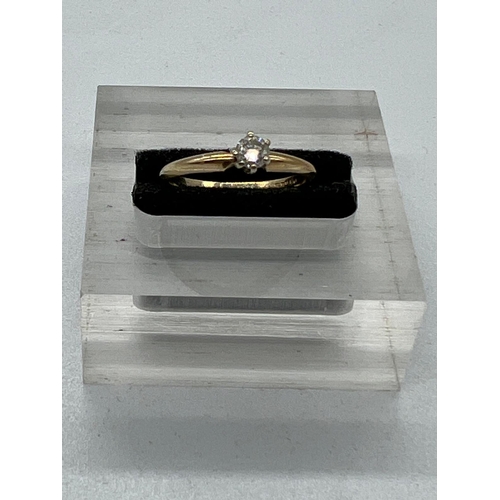 568 - A 14ct gold diamond ring, size L