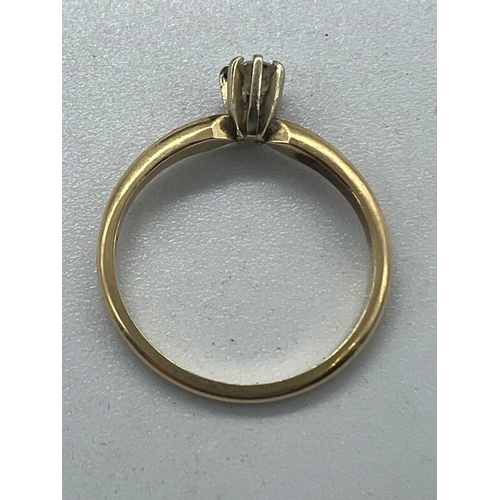 568 - A 14ct gold diamond ring, size L