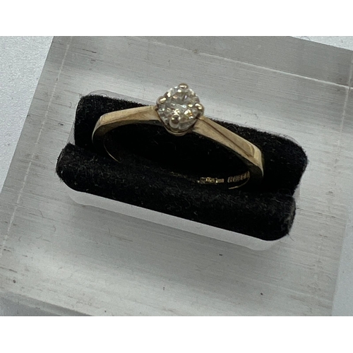 570 - A 9ct gold diamond ring, approximate size N, (2.6g)