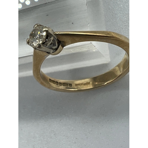 570 - A 9ct gold diamond ring, approximate size N, (2.6g)