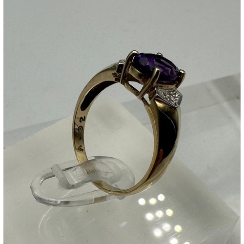 576 - A 9ct gold amethyst and diamond ring, approximate size M1/2