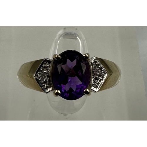 576 - A 9ct gold amethyst and diamond ring, approximate size M1/2