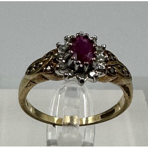 577 - A 9ct gold ruby and diamond ornate ring in yellow gold setting, approximate size O1/2