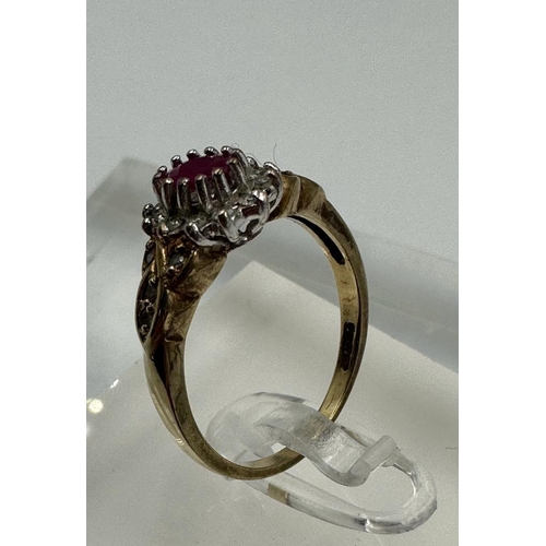 577 - A 9ct gold ruby and diamond ornate ring in yellow gold setting, approximate size O1/2