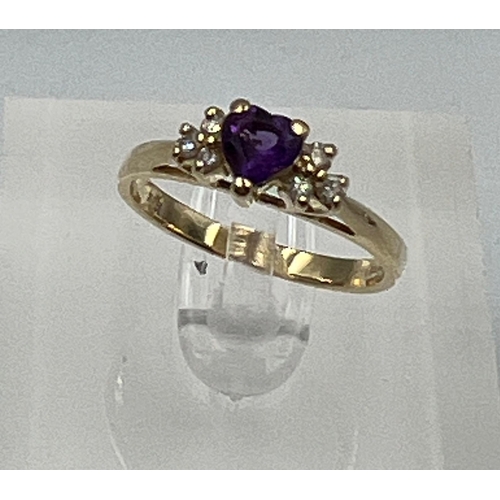 580 - A 14ct gold amethyst and diamond shoulders with a heart shaped central stone on a 14ct yellow gold s... 