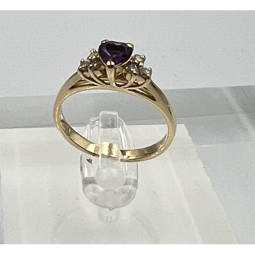 580 - A 14ct gold amethyst and diamond shoulders with a heart shaped central stone on a 14ct yellow gold s... 