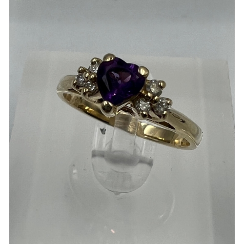 580 - A 14ct gold amethyst and diamond shoulders with a heart shaped central stone on a 14ct yellow gold s... 