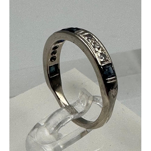 583 - A diamond and sapphire, half eternity style ring set in 18ct white gold, approximate size M