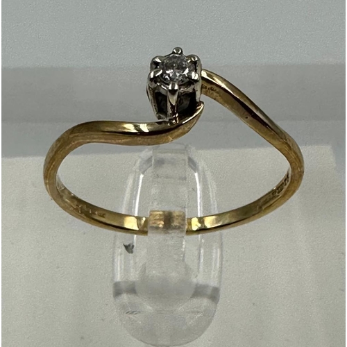 584 - A 9ct and diamond wishbone style ring, approximate size P 1/2and weight 1.5g.