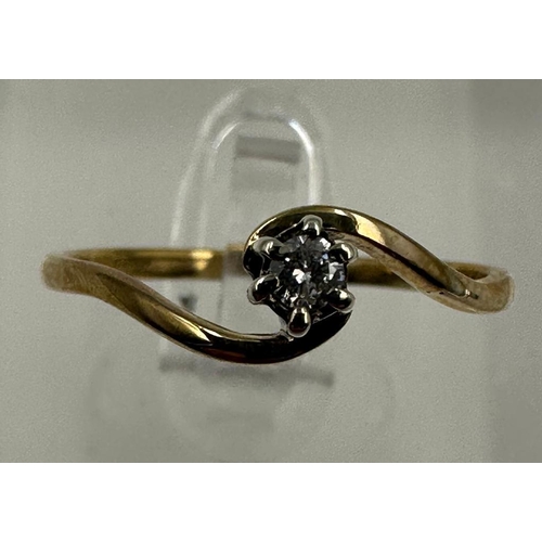 584 - A 9ct and diamond wishbone style ring, approximate size P 1/2and weight 1.5g.