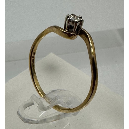 584 - A 9ct and diamond wishbone style ring, approximate size P 1/2and weight 1.5g.