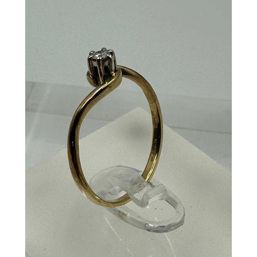 584 - A 9ct and diamond wishbone style ring, approximate size P 1/2and weight 1.5g.