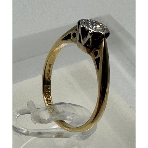 586 - An 18ct yellow gold and platinum set diamond ring, approximate size J1/2