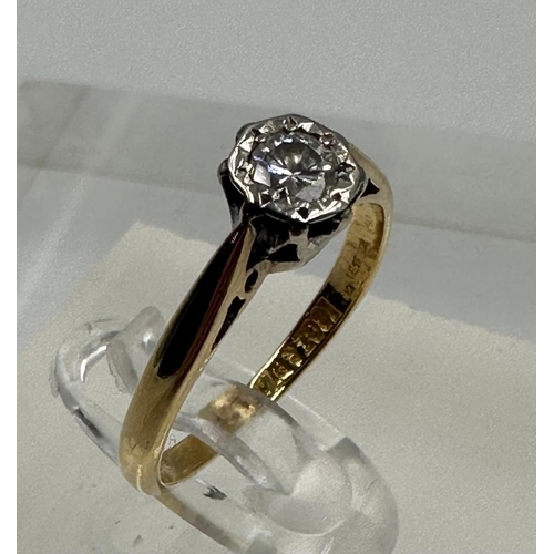 586 - An 18ct yellow gold and platinum set diamond ring, approximate size J1/2