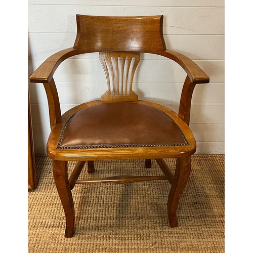 59 - An oak desk chair Edwardian style leather seat and studded detail