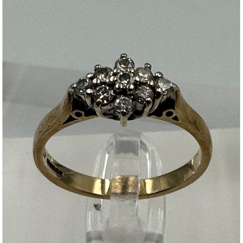 591 - A 9ct gold ring with diamond cluster setting, approximate total weight 2.5g, size N