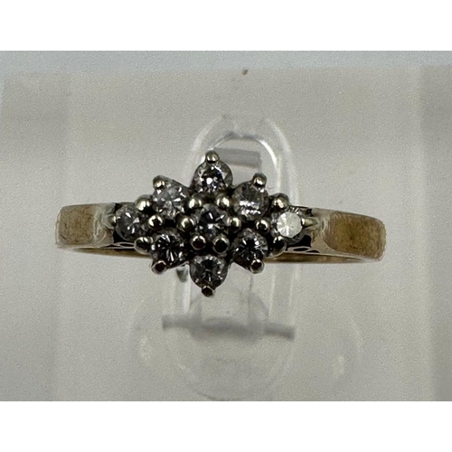 591 - A 9ct gold ring with diamond cluster setting, approximate total weight 2.5g, size N