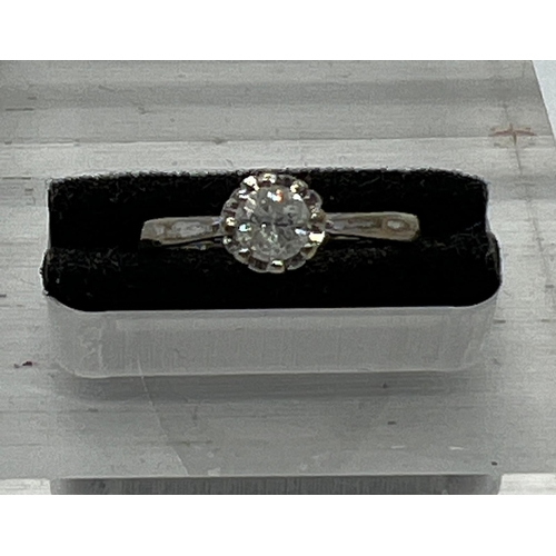 592 - A 9ct white  gold and diamond ring, size H